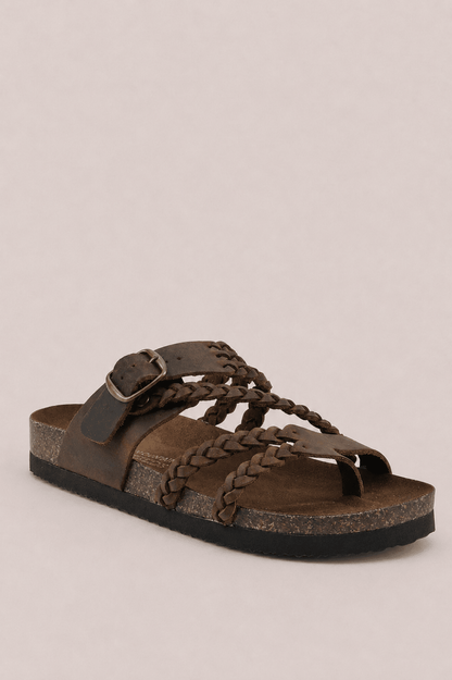 Sandalias trenzadas elegantes de Vera Serrat, con diseño sofisticado y detalles en piel, ideales para ocasiones especiales.